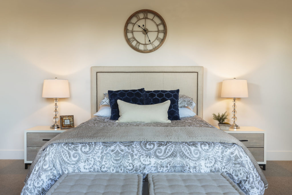 Lake Oswego, Oregon, USA,Bed and lamps in ornate bedroom