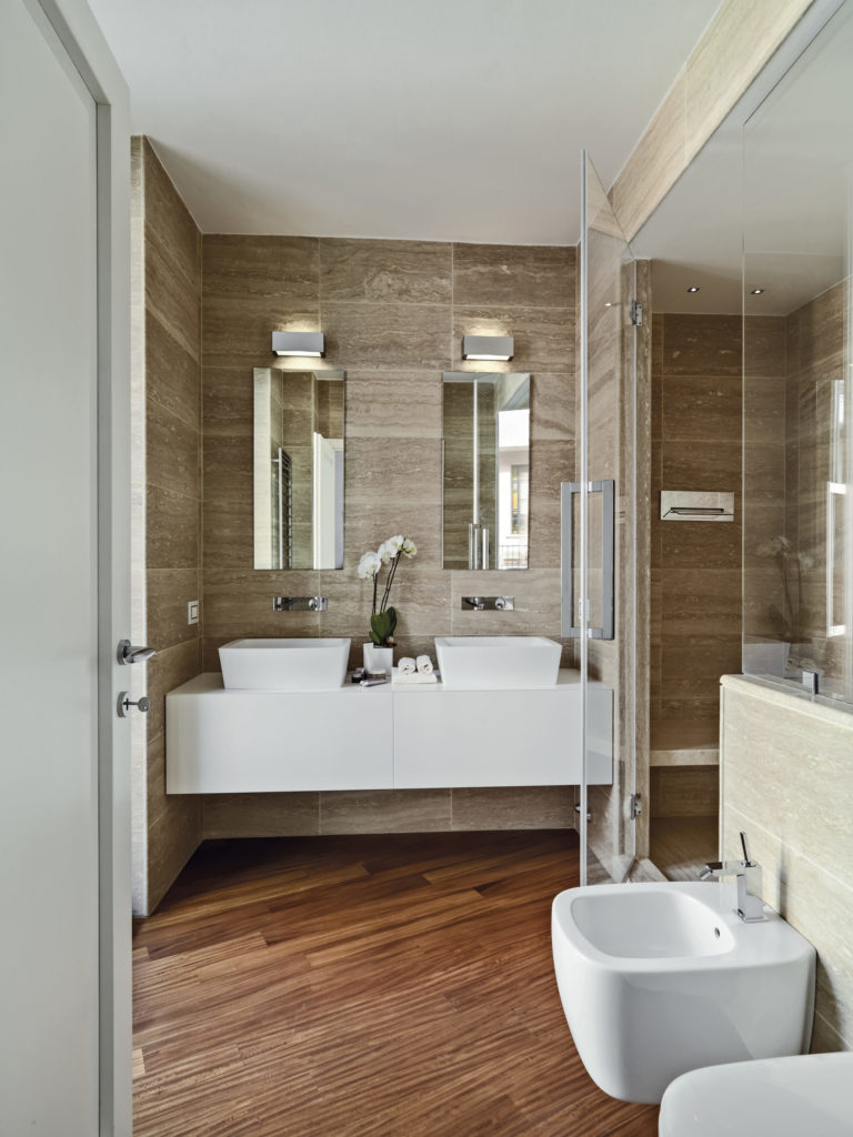 modern bathroom interior with wooden floor in the foreground the