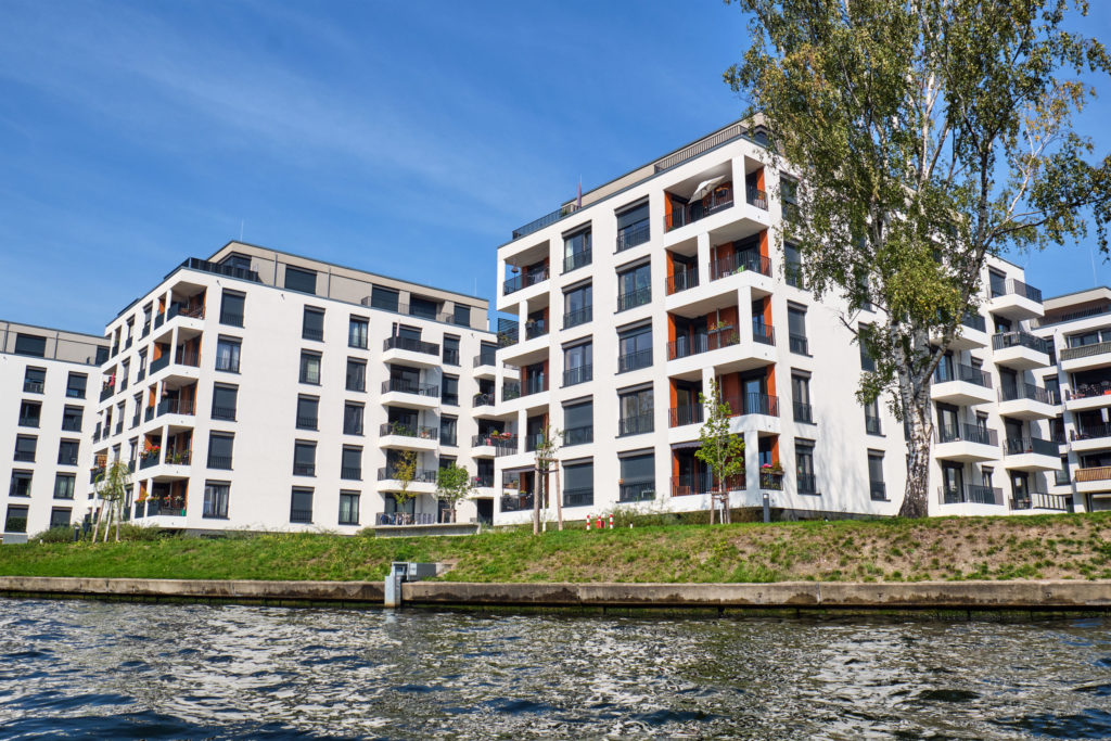 modern-apartment-buildings-at-the-river-spree-2025-03-06-03-22-52-utc